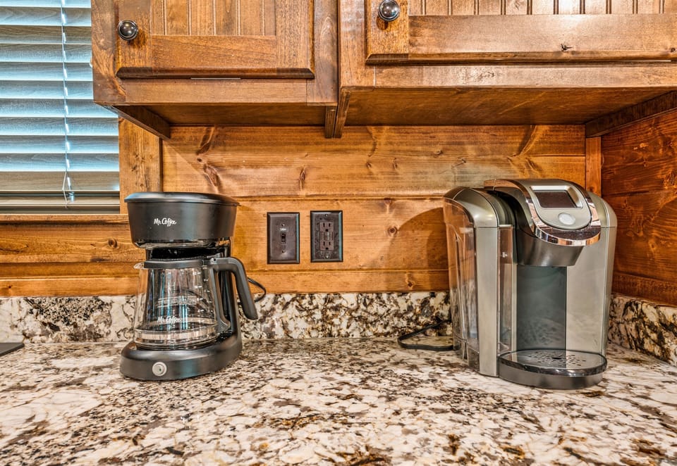 Cozy corner of a kitchen showcasing a traditional coffee maker beside a modern single-serve coffee machine
