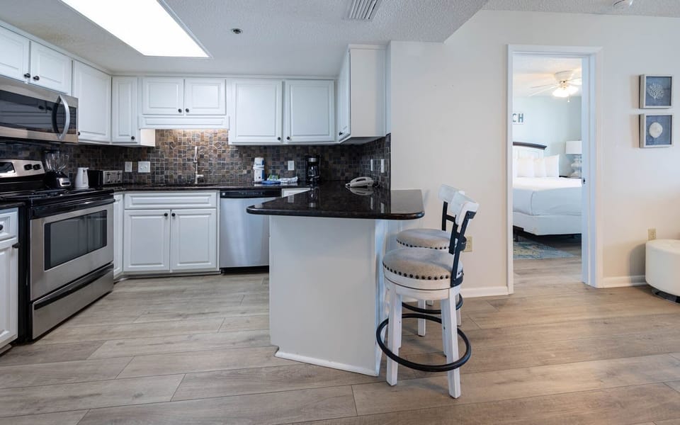Condo, 2 Bedrooms | Private kitchen | Fridge, oven, coffee/tea maker