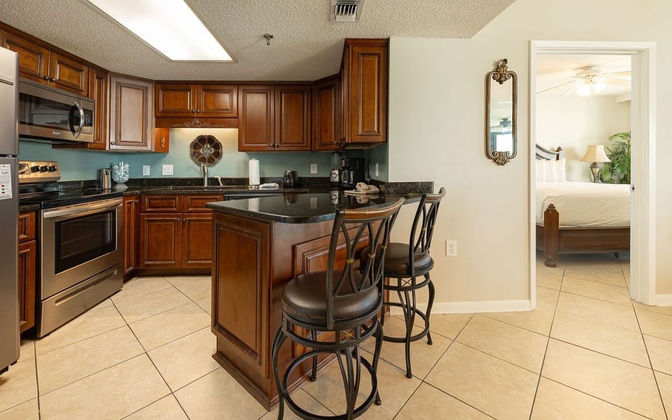 Condo, 2 Bedrooms | Private kitchen | Fridge, oven, coffee/tea maker