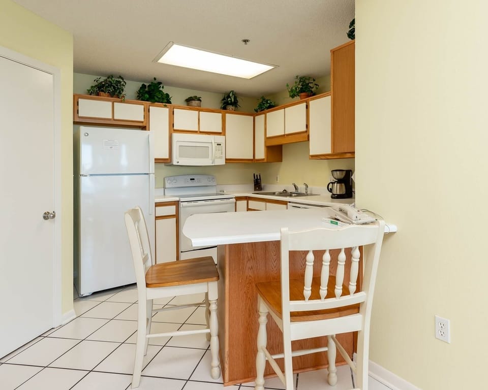 Condo, 2 Bedrooms | Private kitchen | Coffee/tea maker, fridge, oven