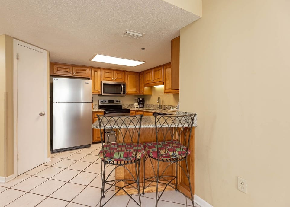 Condo, 2 Bedrooms | Private kitchen | Coffee/tea maker, fridge, oven