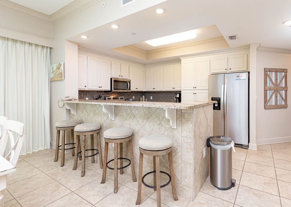 Condo, 4 Bedrooms | Private kitchen | Coffee/tea maker, fridge, oven