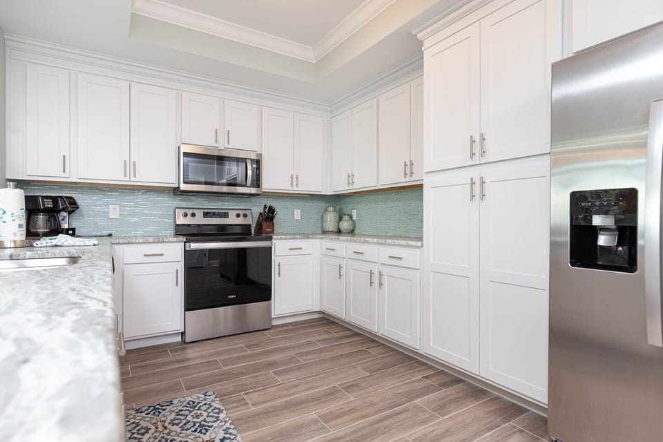 Condo, 3 Bedrooms | Private kitchen | Coffee/tea maker, fridge, oven