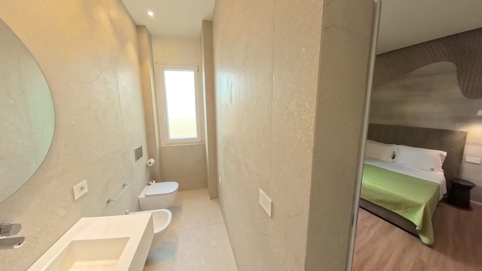 Deluxe Double or Twin Room | Bathroom | Shower, rainfall showerhead, hair dryer, bidet