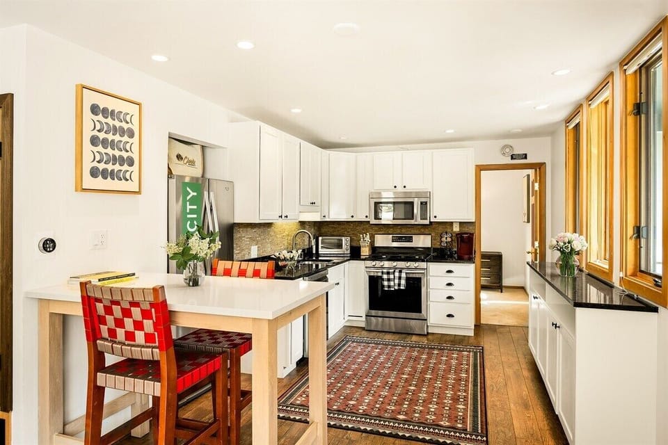 Fully-equipped kitchen with stainless appliances