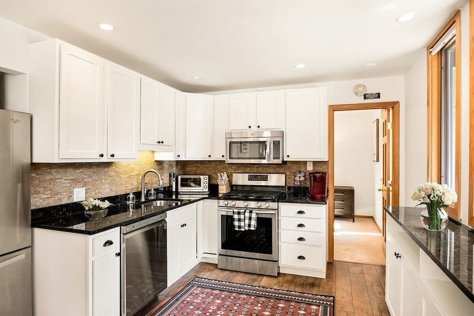 Fully-equipped kitchen with stainless appliances