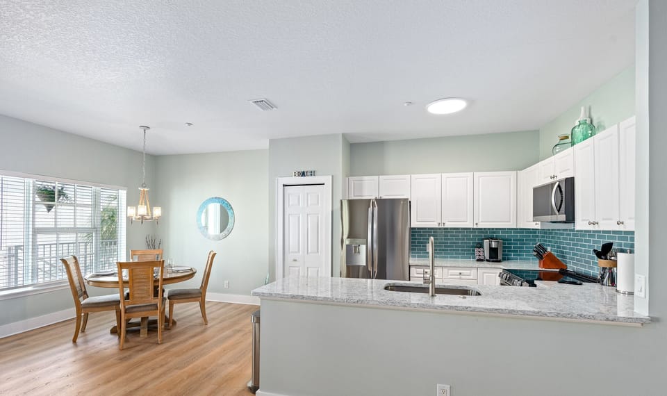 Gorgeous Stainless Steel Kitchen and Dining Area