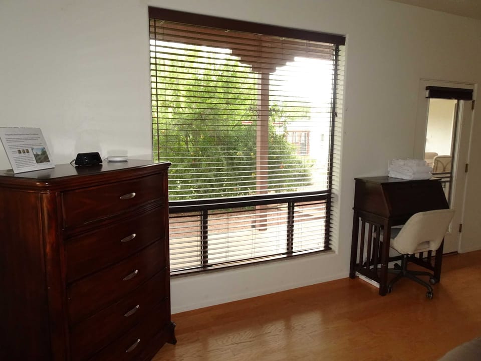 Bedroom 2 of 4 (Meadow-facing) Desk workstation and dresser (25 of 35)
