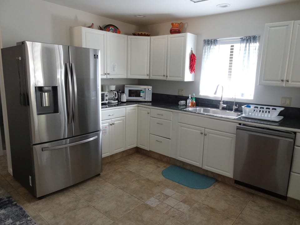 Kitchen refrigerator and prep area (11 of 19)