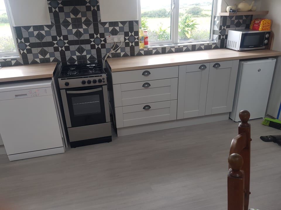 A kitchen to cook with all facilities 