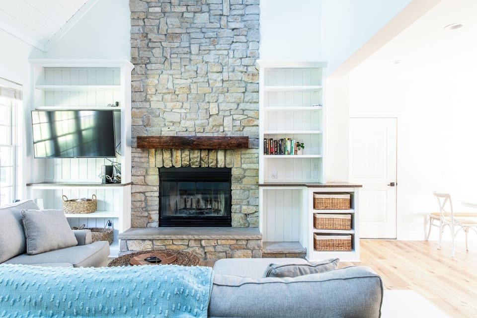 Fireplace and TV with cozy seating in the living room