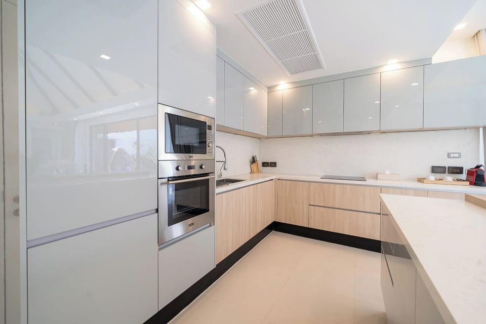Luxury Villa | Private kitchen | Full-size fridge, microwave, oven, stovetop