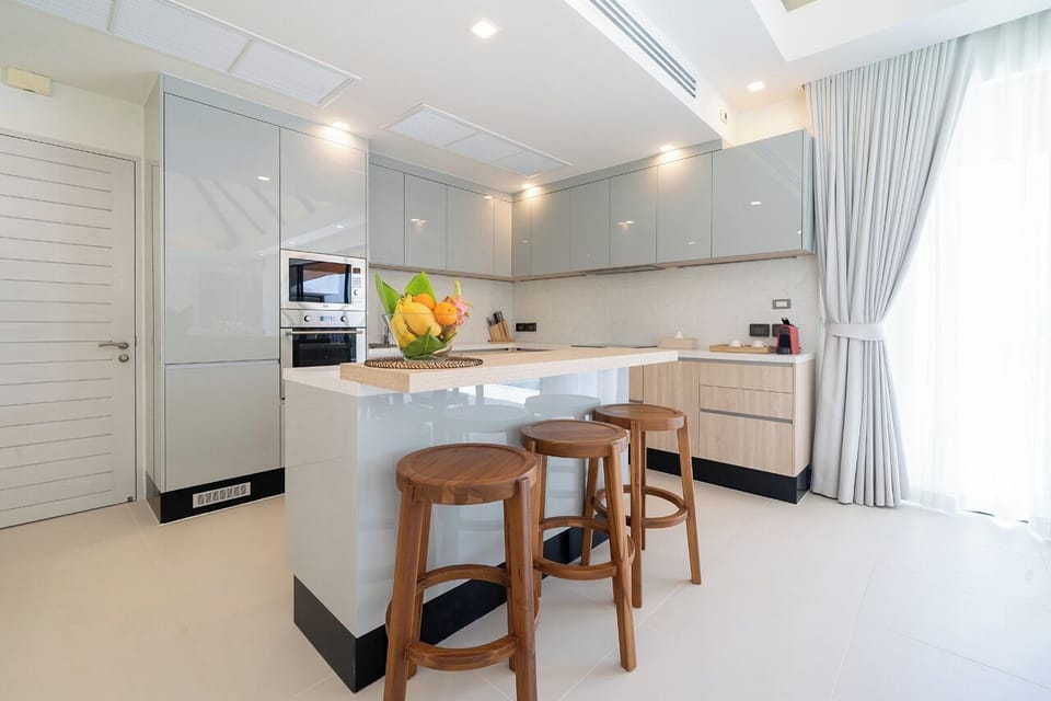 Luxury Villa | Private kitchen | Full-size fridge, microwave, oven, stovetop