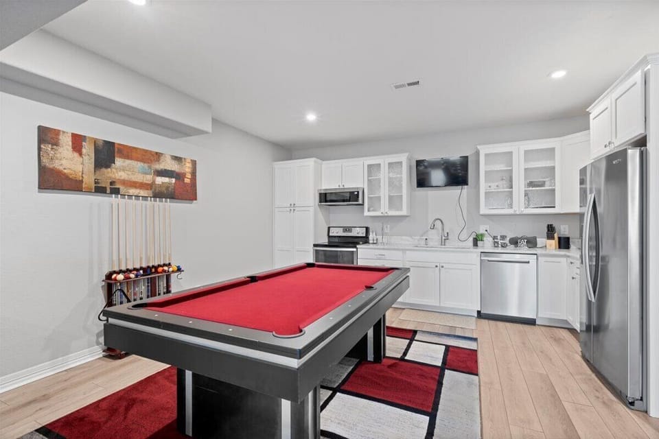 Game Space with Pool Table and Kitchen in Basement