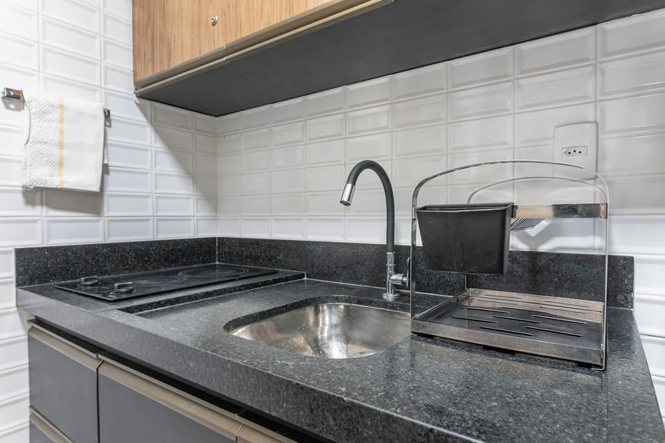 Basic Apartment | Private kitchen | Fridge, cookware/dishes/utensils, paper towels