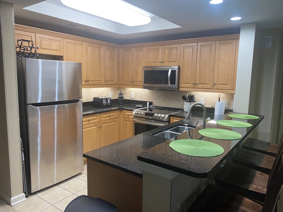 Kitchen w/ Dining Bar seating for Four