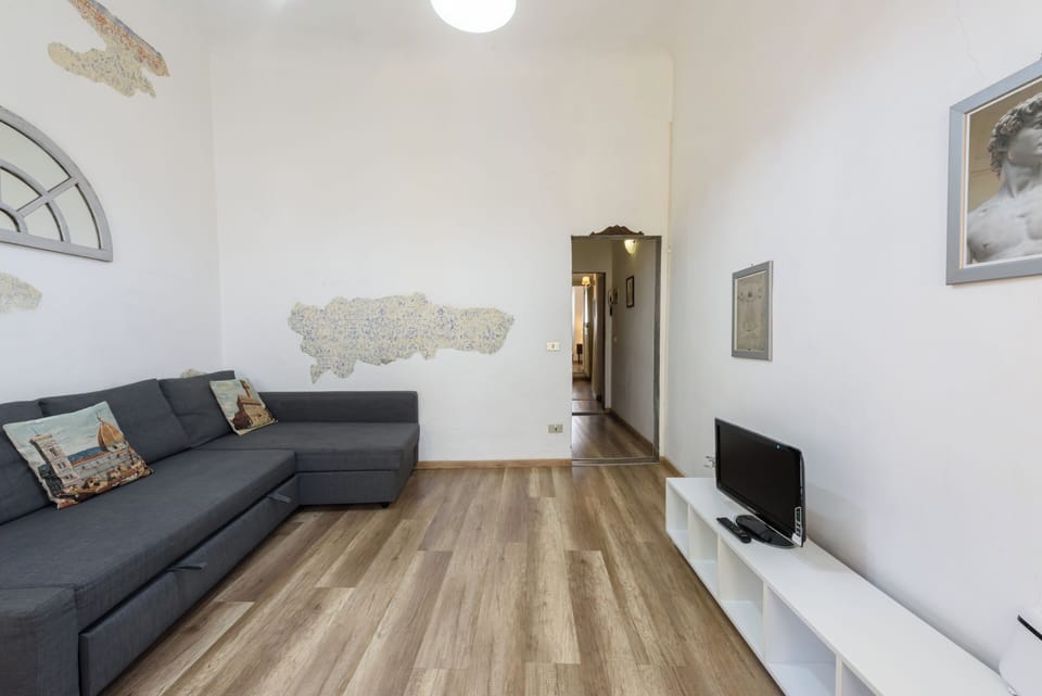 Comfort Apartment | Living area | 32-inch flat-screen TV with digital channels