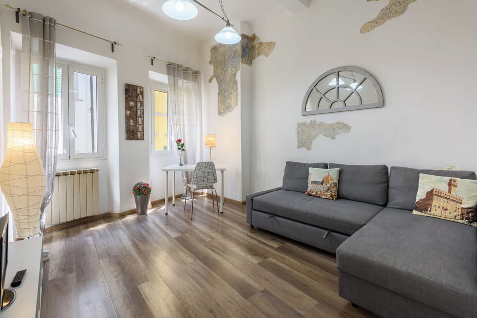 Comfort Apartment | Living area | 32-inch flat-screen TV with digital channels