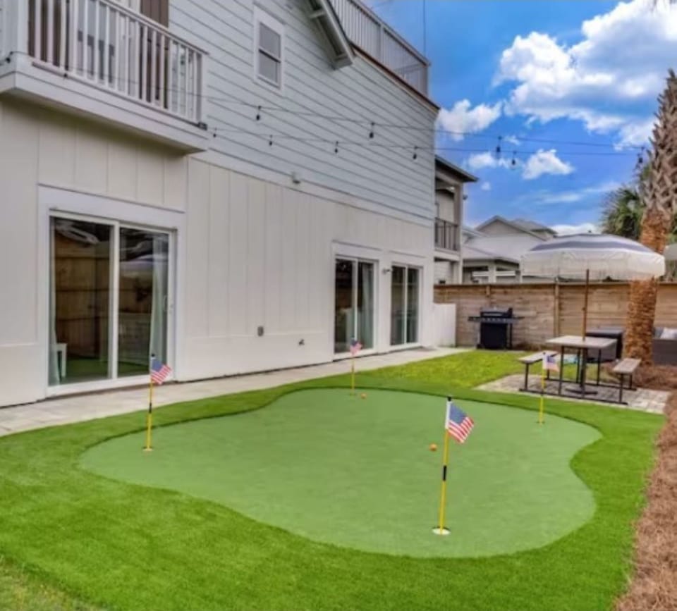 New 4 hole putting green in the back yard. 