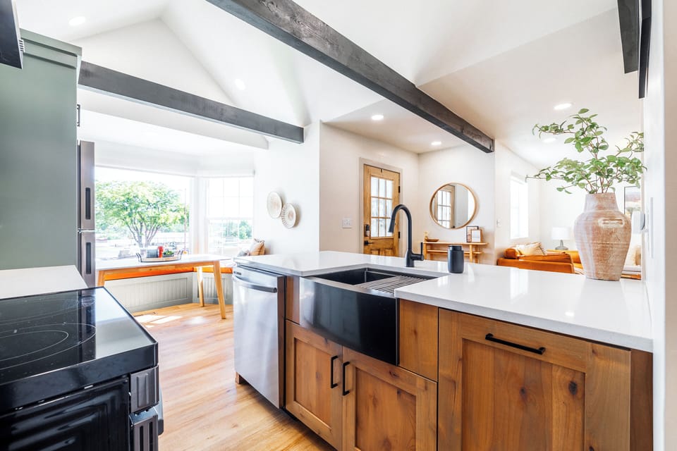 Kitchen- vaulted ceilings, bay window, open-concept 
