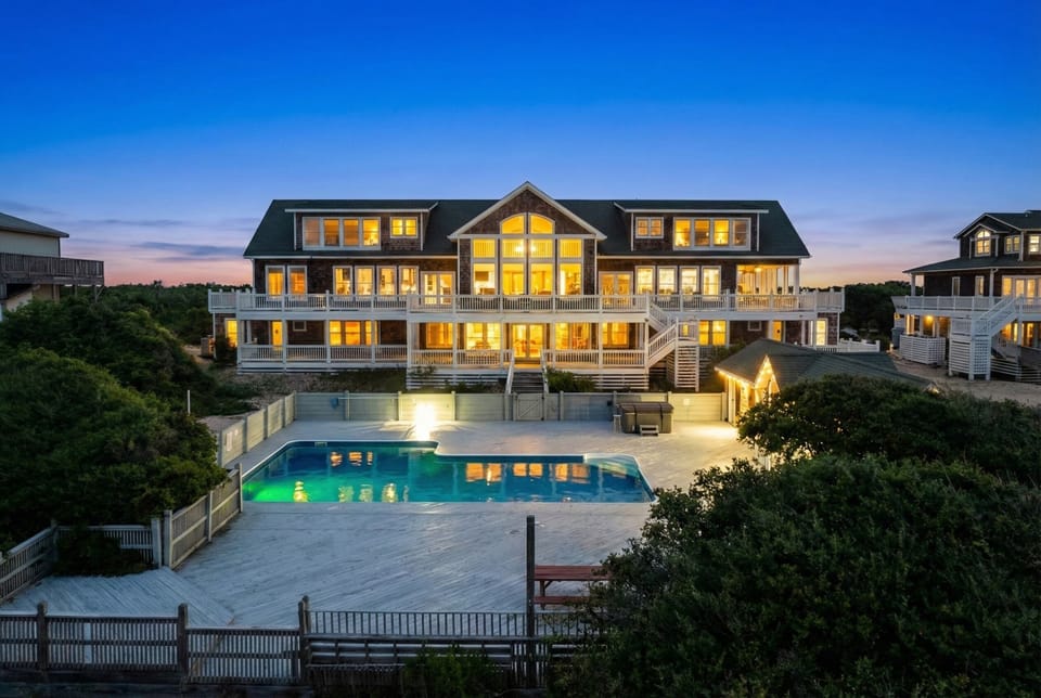 Mark Twain Estate at Night — Illuminated Pool & Oceanfront Grounds | Evening Reception & After-Hours Gathering Space | Corolla 4x4, OBX