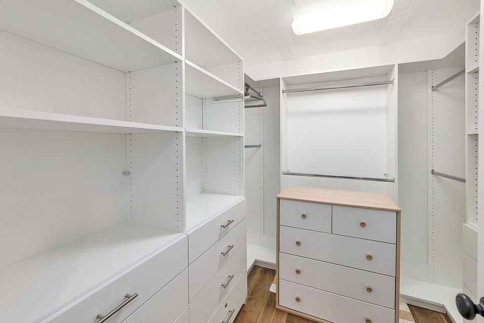 Primary Bedroom Suite closet.  Large enough for a pack n play.