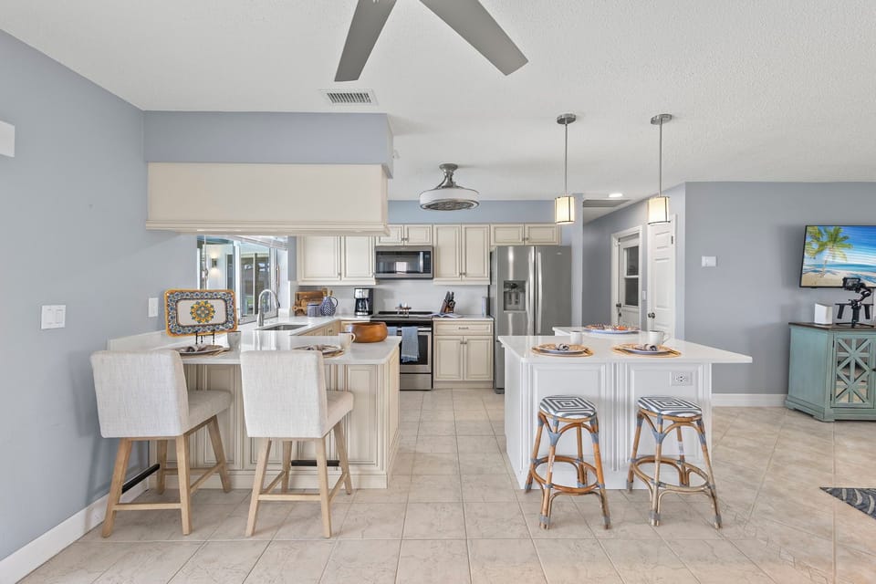 The kitchen has additional seating at the island