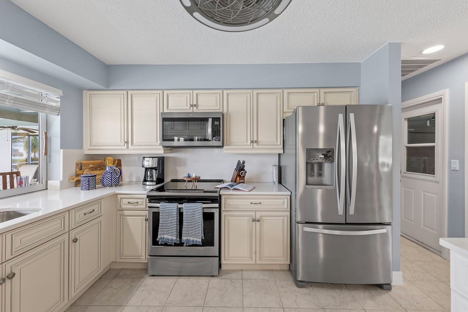 The kitchen has stainless steel appliances