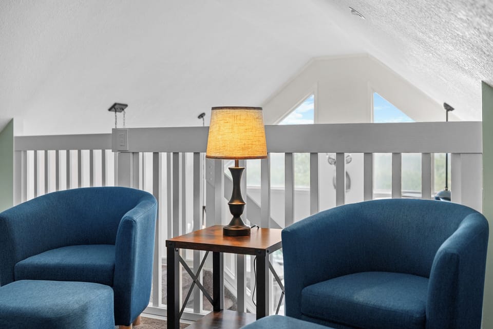 Enjoy a book and a glass of wine in the reading area up in the Loft