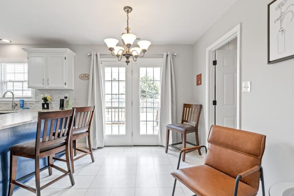 Additional seating and French door access to the backyard make this kitchen the heart of the home.
