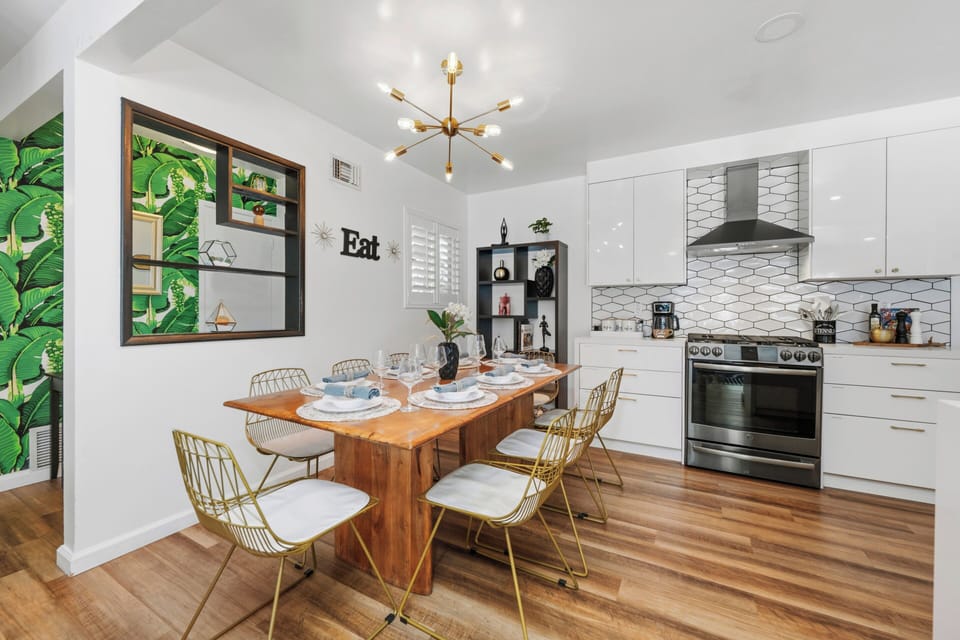 The vibe carries inside to the dining room with enough seating for 8
