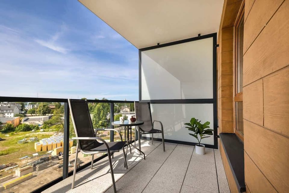 Balcony with dining area.