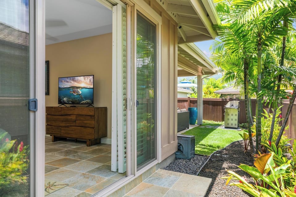 The lanai is a serene spot for reading or unwinding