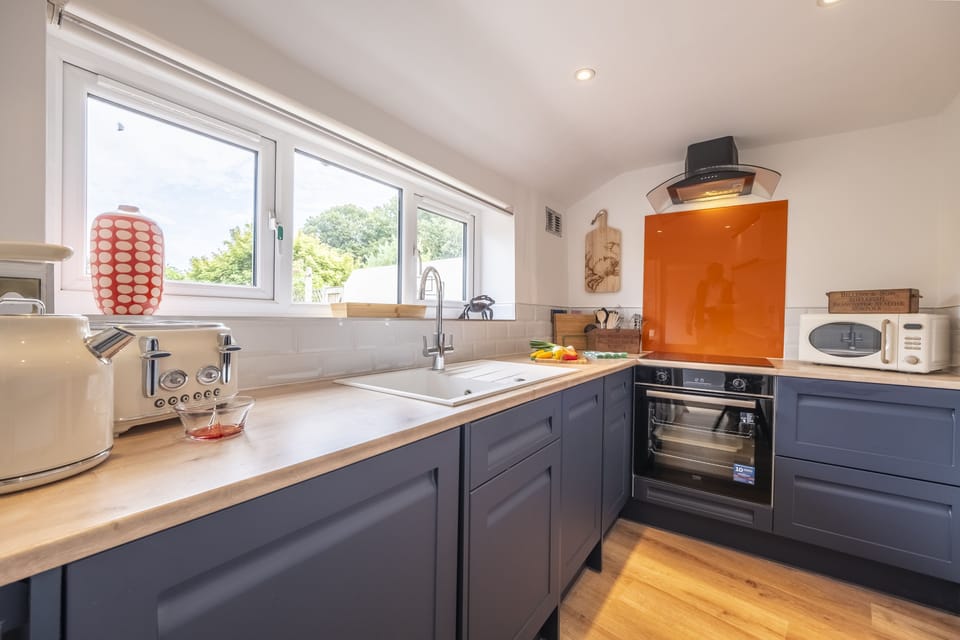 Ground floor: The kitchen has windows overlooking the garden