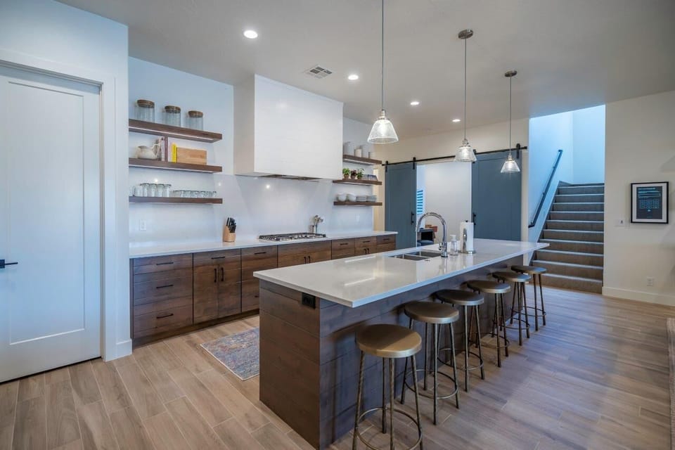 Expansive kitchen with large island seating for 6 people