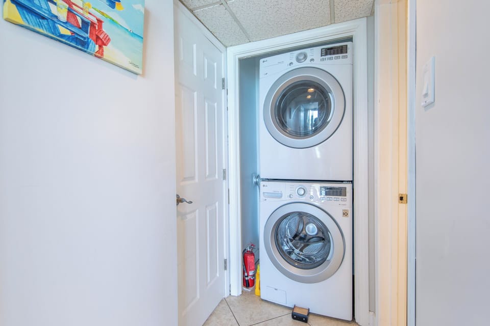 Washer and dryer in unit.