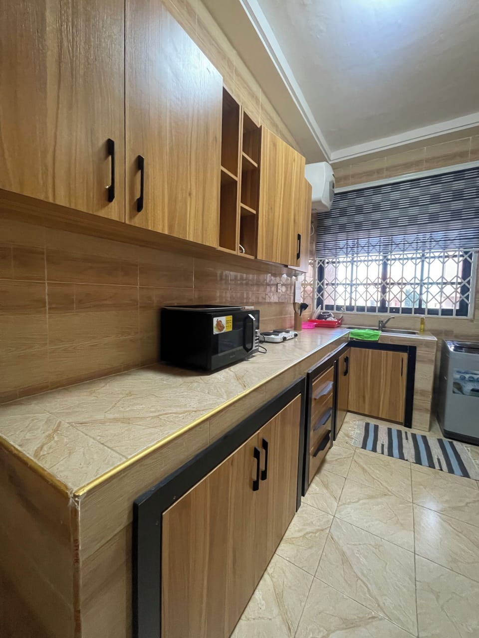 Apartment | Private kitchen | Full-size fridge, microwave, stovetop, rice cooker