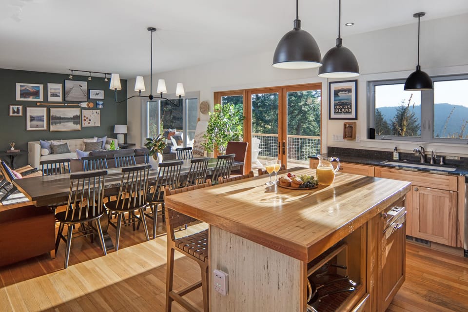 Cook in our fully equipped kitchen with open floor plan and deck access