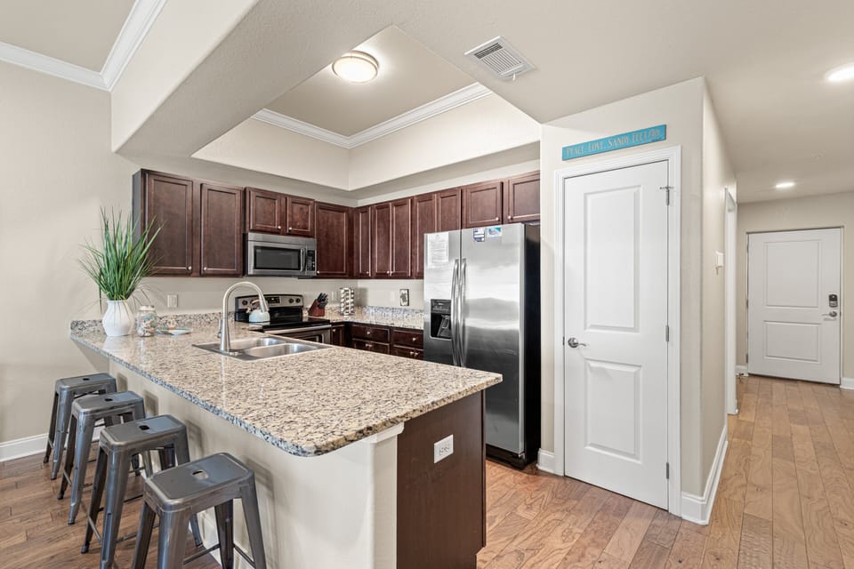 Kitchen Area With Bar Seating for 4