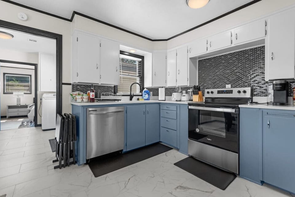 Step into our fully stocked kitchen and unleash your culinary creativity. Whether you`re whipping up a quick snack or preparing a gourmet feast, you`ll find everything you need. Discover more at Blessedbnbs.net.