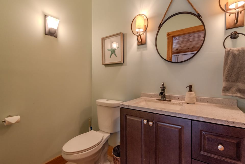 Upstairs guest 1/2 bath, directly off the upstairs living room for easy access. 