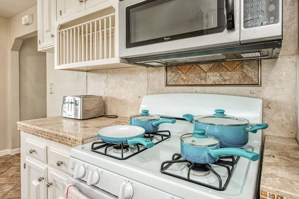 Inspire culinary creations in this well-appointed kitchen.