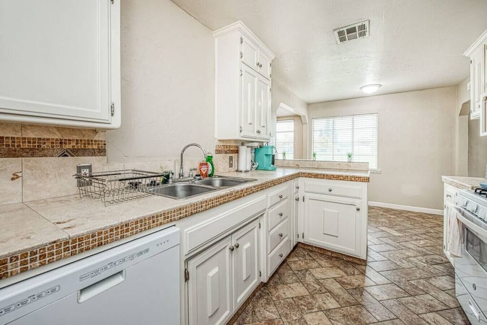 Craft savory meals and cherish moments around this kitchen.