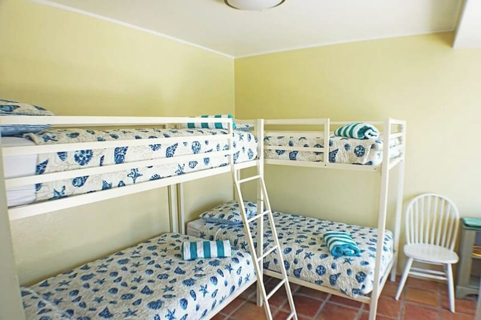 ...the children's bedroom, which includes 2 bunkbeds...