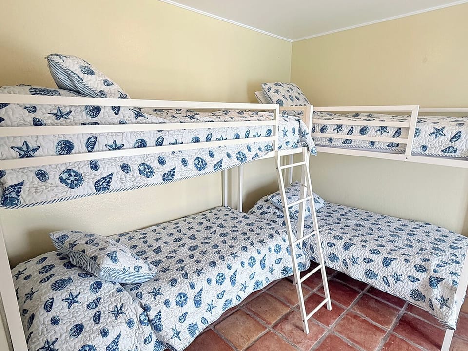The 4th bedroom on the lower level has 2 bunkbeds...