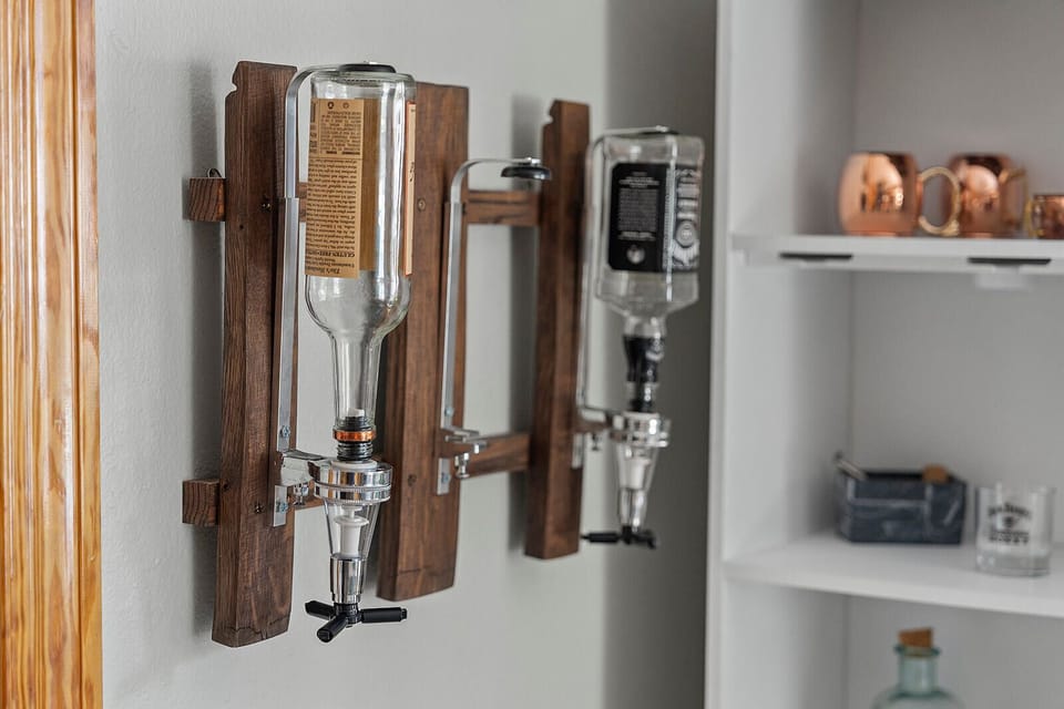 Beverage station: Enjoy community vibes with stylish drink dispensers and chic glassware!