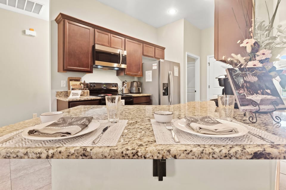 Cook up a storm in the fully equipped kitchen at Calvin's Corner. Enjoy king beds, master bathroom, and more at 1919 Calvin Court.