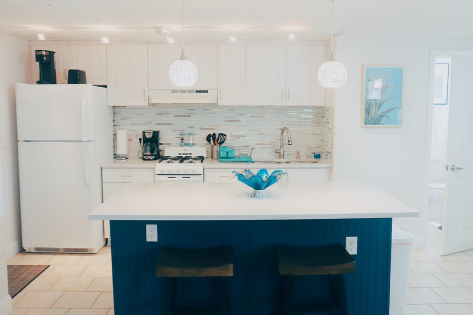 Full kitchen - equipped with refrigerator, freezer, oven and a full island.  