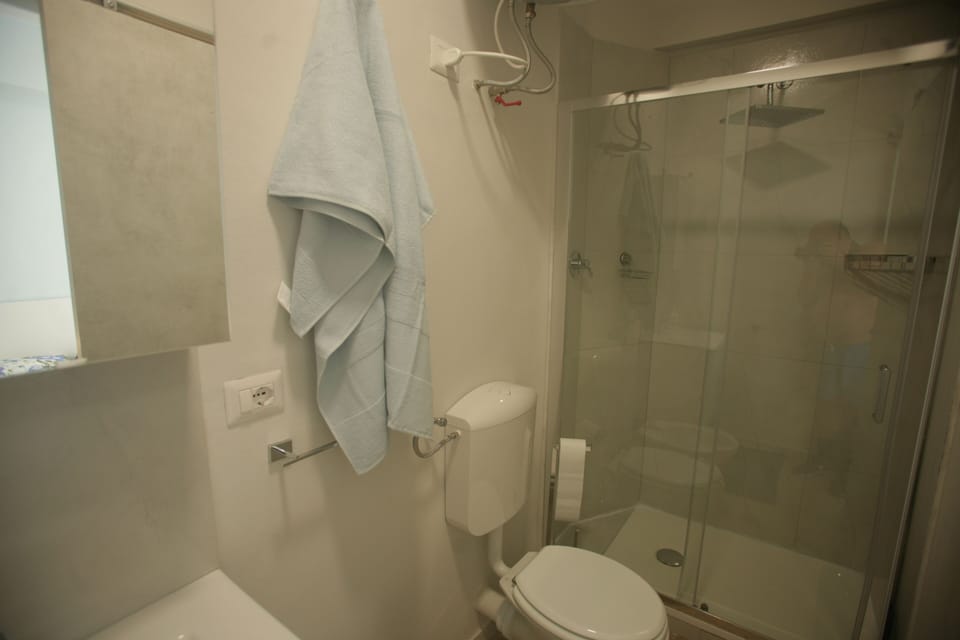 Double or Twin Room | Bathroom | Shower, rainfall showerhead, hair dryer, bidet