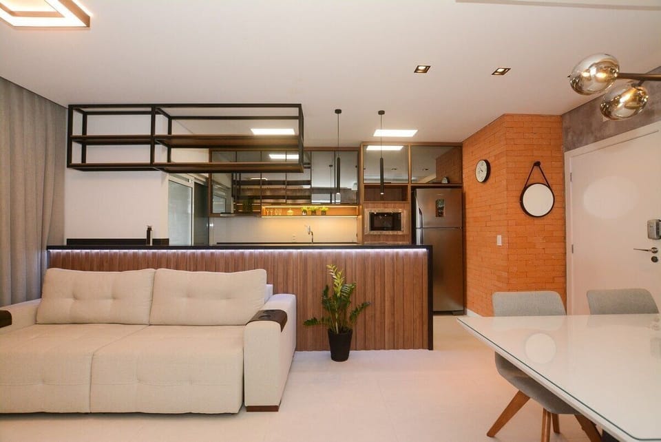 Deluxe Apartment, Pool Access | Living area | 50-inch Smart TV with digital channels, Netflix, foosball